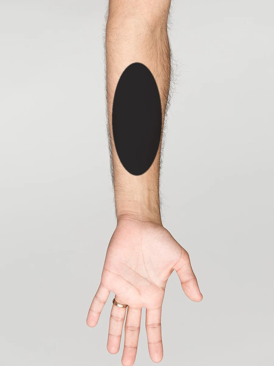 A large tattoo, 10cm and over, on a forearm