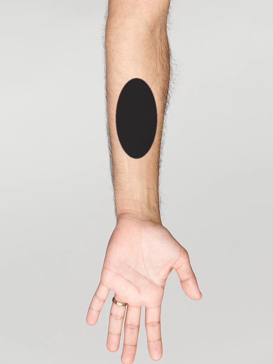 A medium tattoo, about 7.5cm, on a forearm