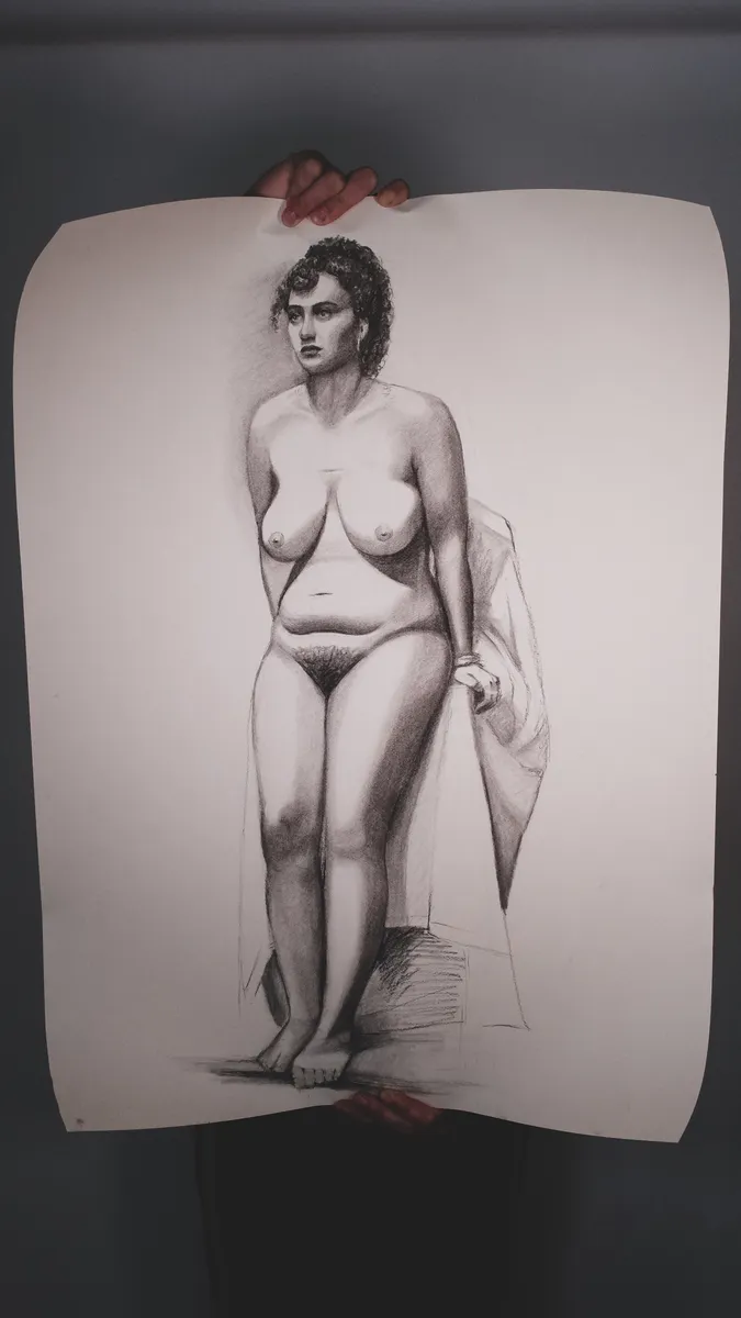 Figure drawing of a standing nude, held up by Britt Beale